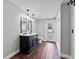 Bathroom featuring double vanity with modern fixtures and subway-tiled shower at 504 Prado Pl, Lakeland, FL 33803