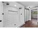 Bathroom featuring a subway tiled shower with black accents and modern fixtures at 504 Prado Pl, Lakeland, FL 33803