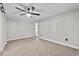 Carpeted bedroom featuring a ceiling fan and bright white trim at 504 Prado Pl, Lakeland, FL 33803
