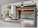 Stylish kitchen features granite countertops, stainless steel appliances, and an open design at 504 Prado Pl, Lakeland, FL 33803