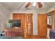 Bedroom showcasing a closet, wood-look flooring, and access to another room at 5313 Nichols W Dr, Lakeland, FL 33812