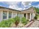 Close-up of a well maintained home featuring mature landscaping and a manicured lawn at 5313 Nichols W Dr, Lakeland, FL 33812