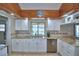 Beautiful kitchen with granite countertops, stainless steel appliances, and lots of natural light at 5313 Nichols W Dr, Lakeland, FL 33812