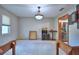 Open Living Room With View Of Dining Room With Liquor Bar And Kitchen With Stainless Steel Appliances at 5313 Nichols W Dr, Lakeland, FL 33812