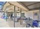 Outdoor patio area with grill, seating, and view of the pool area at 5313 Nichols W Dr, Lakeland, FL 33812