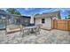 A cozy outdoor patio provides the perfect setting for al fresco dining and entertaining with easy access to the pool area at 5313 Nichols W Dr, Lakeland, FL 33812