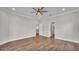 Bedroom with modern ceiling fan and recessed lights showcasing doors to other rooms at 5548 Woodwind Hills Dr, Lakeland, FL 33812
