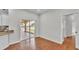 Eat-in kitchen with access to screened in lanai and back yard at 5548 Woodwind Hills Dr, Lakeland, FL 33812