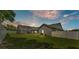 Spacious backyard with a screened-in pool and patio, perfect for outdoor entertaining at 5579 Summerland Hills Dr, Lakeland, FL 33812