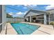 The beautiful in-ground pool and screened patio are perfect for entertaining guests or relaxing in a private backyard oasis at 5579 Summerland Hills Dr, Lakeland, FL 33812