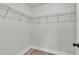 Organized walk-in closet with multiple shelves and ample storage space at 577 Majestic Gardens Blvd, Winter Haven, FL 33880