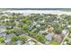 Aerial view of the home, highlighting its prime location with mature trees and proximity to the lake at 608 Finney St, Lakeland, FL 33803