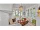 Bright breakfast nook featuring cushioned seating and views of the surrounding landscape at 608 Finney St, Lakeland, FL 33803