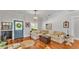 Cozy living room with hardwood floors, comfortable seating, and stylish decor at 608 Finney St, Lakeland, FL 33803