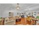 Spacious living room with hardwood floors, comfortable seating, and open layout at 608 Finney St, Lakeland, FL 33803
