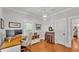 Bright home office with hardwood floors, a large desk, and ample storage space at 608 Finney St, Lakeland, FL 33803