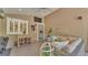 Inviting outdoor patio with cozy seating, ceiling fan, and stylish decor at 608 Finney St, Lakeland, FL 33803