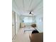 Bedroom with carpet, ceiling fan, and a closet at 622 Elizabeth Ln, Lakeland, FL 33809