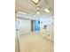 View of kitchen with large white refrigerator and ample cabinet space at 622 Elizabeth Ln, Lakeland, FL 33809