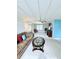 Bright living room with a brown sofa and plush carpet with lots of natural light at 622 Elizabeth Ln, Lakeland, FL 33809