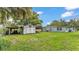 Large backyard with a shed and carport, offering ample space and storage at 640 Forrest Dr, Bartow, FL 33830