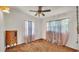 Bedroom with a dresser, carpet, and large curtains at 640 Forrest Dr, Bartow, FL 33830