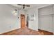 This bedroom features neutral walls, closet, and ceiling fan at 640 Forrest Dr, Bartow, FL 33830