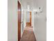 Hallway features neutral walls, carpet, and doors at 640 Forrest Dr, Bartow, FL 33830