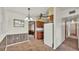The kitchen area features brown cabinets, tile flooring, and standard appliances at 640 Forrest Dr, Bartow, FL 33830