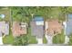 Birds eye view of a home in a neighborhood and nearby lawns at 6406 Butternut Dr, Lakeland, FL 33813