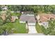 Overhead view of home, landscaping, and pool; shows neighborhood at 6406 Butternut Dr, Lakeland, FL 33813