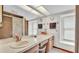 A full bathroom with double sinks, tile floor and walk-in shower at 6406 Butternut Dr, Lakeland, FL 33813
