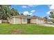 Charming single-story home featuring an attached two-car garage and a well-maintained front yard at 6406 Butternut Dr, Lakeland, FL 33813