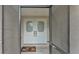 A front door entrance showcasing double doors with glass panels and bronze hardware at 6406 Butternut Dr, Lakeland, FL 33813