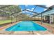 Beautiful screened-in pool, ideal for enjoying the outdoors in privacy at 6406 Butternut Dr, Lakeland, FL 33813