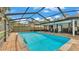 Inviting screened-in pool area with plenty of space for lounging and entertaining at 6406 Butternut Dr, Lakeland, FL 33813