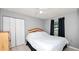 Cozy bedroom featuring a neutral color palette and a window at 6421 Calusa Dr, Lakeland, FL 33813
