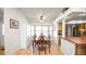 Bright dining area with a large window and ample seating at 6421 Calusa Dr, Lakeland, FL 33813