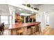 Kitchen features a breakfast bar, ample counter space, and tile flooring at 6421 Calusa Dr, Lakeland, FL 33813