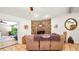 Inviting living room with a stone fireplace and neutral decor at 6421 Calusa Dr, Lakeland, FL 33813