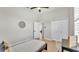 Bright bedroom with wood floors, closet, ceiling fan and a modern style at 6707 Hillis Dr, Lakeland, FL 33813