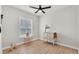 Bright bedroom with wood floors, a ceiling fan, and lots of natural light at 6707 Hillis Dr, Lakeland, FL 33813