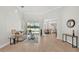 Open-concept living room with access to the pool and dining area at 6707 Hillis Dr, Lakeland, FL 33813