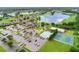 An aerial image of a community with a pool, tennis courts, and clubhouse highlights the recreational amenities available to residents at 6964 Lake Eaglebrooke Dr, Lakeland, FL 33813