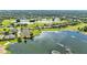 Picturesque aerial view of the community, showcasing lakes, golf courses, and lush greenery at 6964 Lake Eaglebrooke Dr, Lakeland, FL 33813