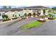 The clubhouse features a covered entrance, with brick columns and well-maintained landscaping, providing a welcoming community hub at 6964 Lake Eaglebrooke Dr, Lakeland, FL 33813