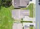 Aerial view of the home displaying the roof and surrounding landscape at 849 Rockingham Rd, Lakeland, FL 33809