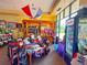 Golf pro shop featuring a variety of golf equipment and apparel displayed in a well-lit retail setting at 9017 Se 119Th St, Summerfield, FL 34491