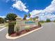 Entrance sign for Sherwood community featuring manicured landscaping and clear signage at 9017 Se 119Th St, Summerfield, FL 34491