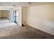 This bedroom features a sliding glass door, ceiling fan, and mirrored closet sliding door at 925 Fenton Ln # 18, Lakeland, FL 33809